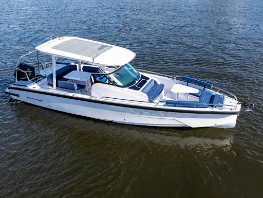 Vacationer chooses a yacht with additional sun protection for their day trip from Miami to West Palm Beach.