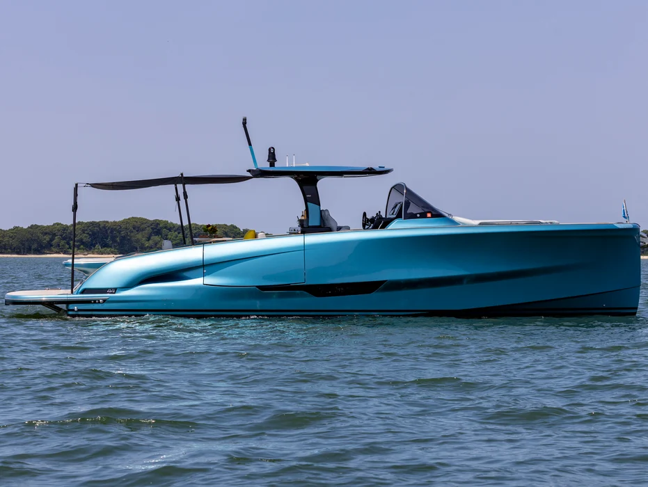 Luxury yacht charter cruising turquoise waters near Palm Beach.