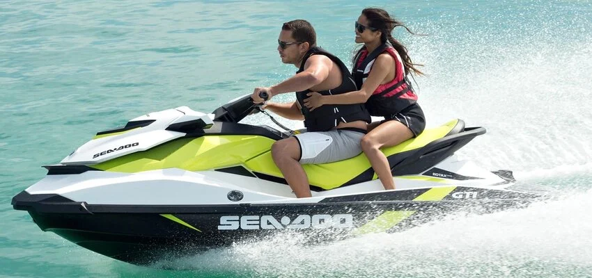 wo riders speeding on Sea-Doo GTI jet ski.